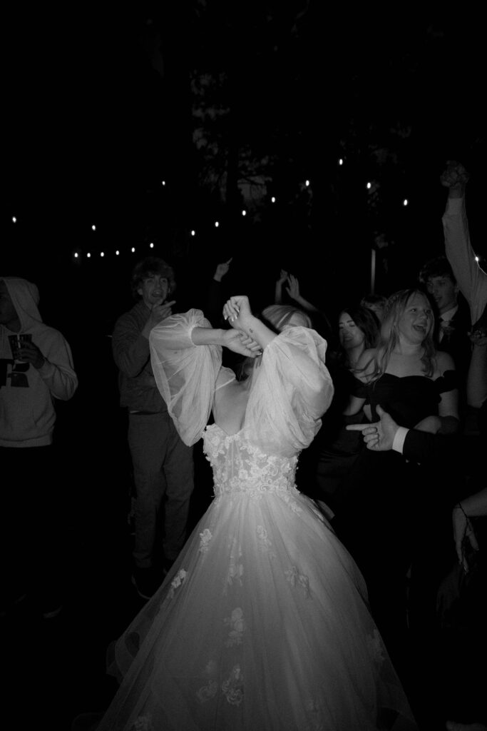 bride dancing during wedding dance party