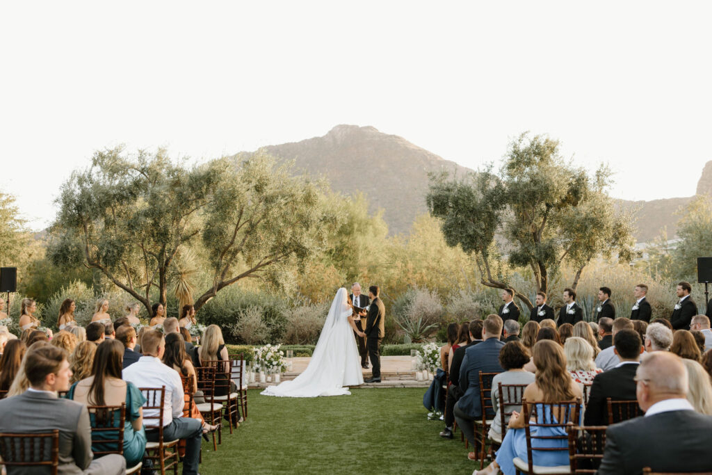 wedding ceremony in front of mountains in arizona