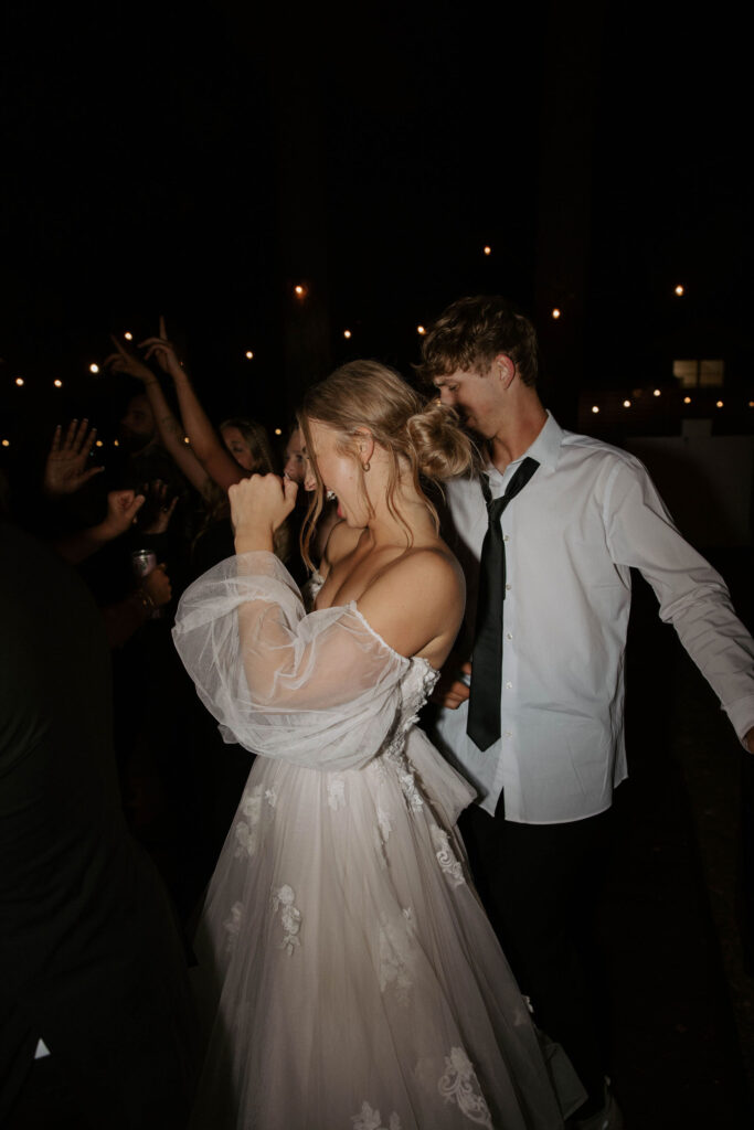 bride and groom dancing during wedding day photos in arizona 