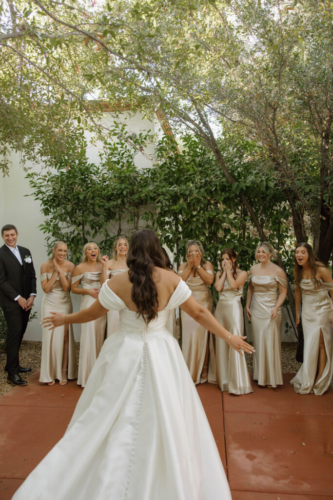 bride and bridesmaids first look during wedding at el chorro lodge in pheonix